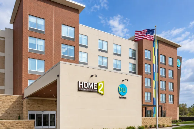 Home2 Suites Spring Hill entrance, enhanced from a venue photograph
